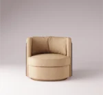 Luxurious beige Brahms armchair with a curved design and dark wood detailing