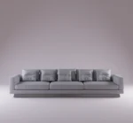 Britten Sofa – Stylish gray sectional sofa with plush cushions and modern minimalist design.