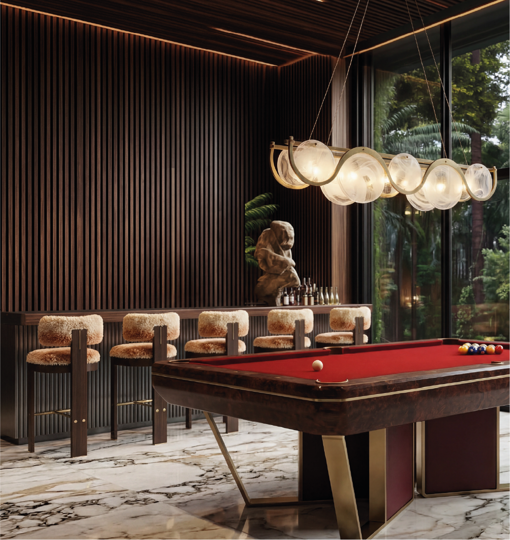Luxury game room with dark wood bar stools featuring cream shearling upholstery, marble flooring, and a red pool table