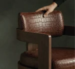 Luxury bar chair with crocodile leather upholstery and dark wood frame