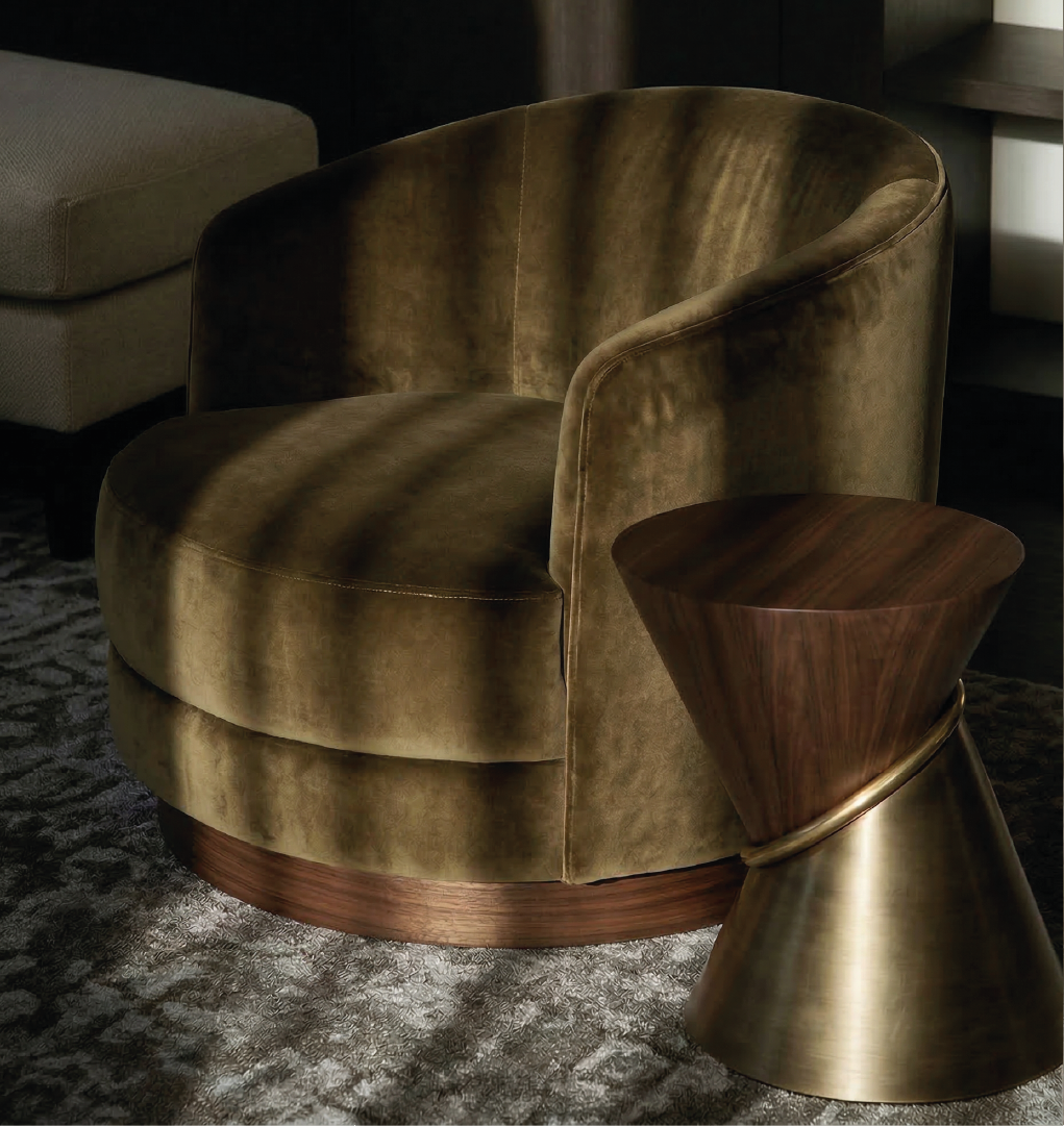 Debussy side table paired with a velvet armchair in a contemporary living room with a rich and cozy design.