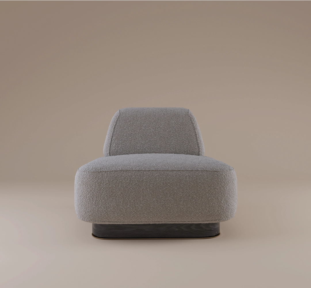 Modern boucle armchair with low profile and sculptural base