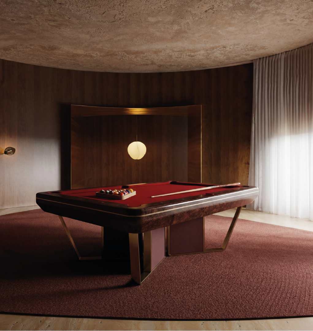 Luxury pool table in wood with red felt in modern interior setting