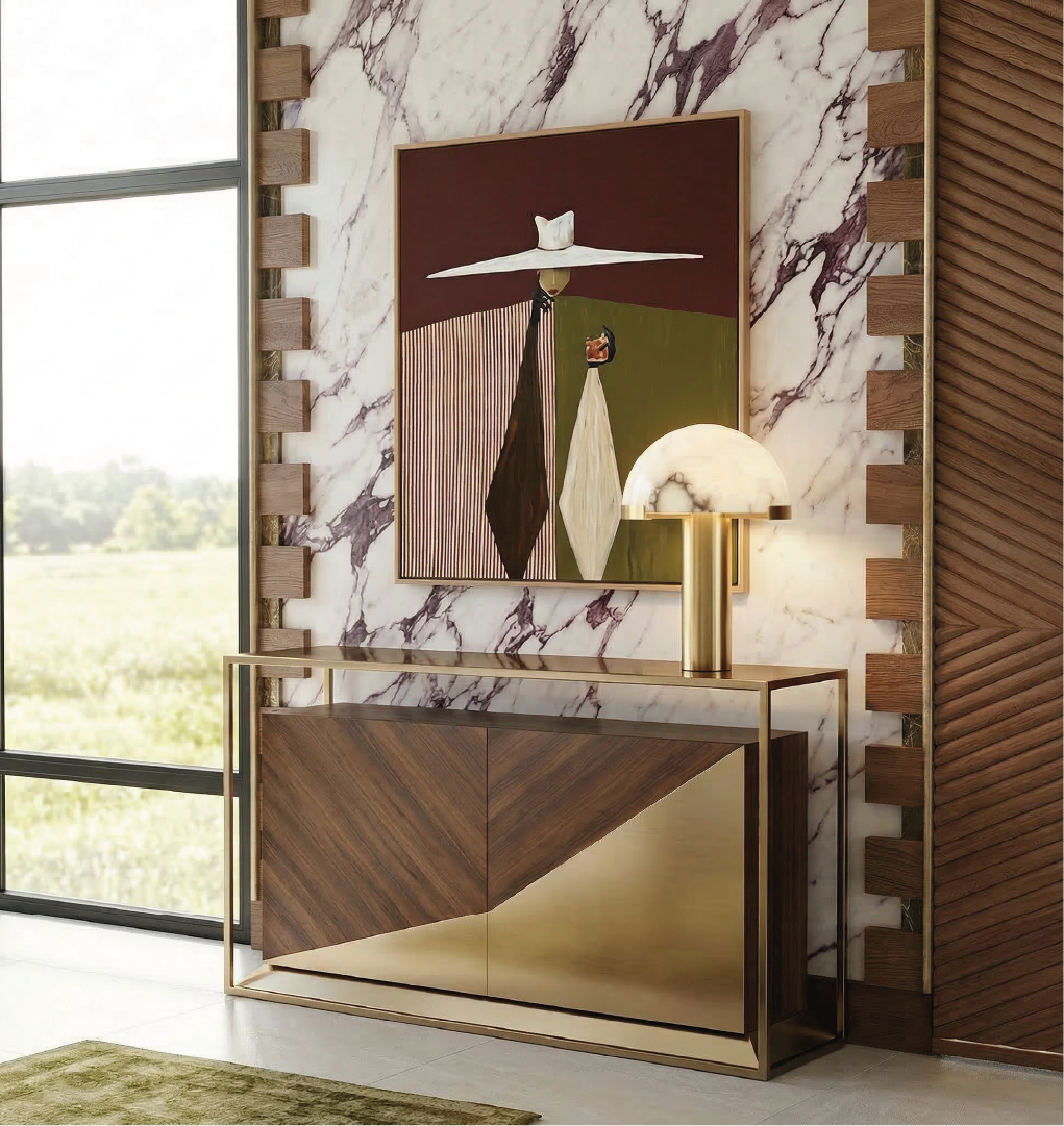 Bach console table styled in a modern interior with marble wall, artwork, and brass table lamp.