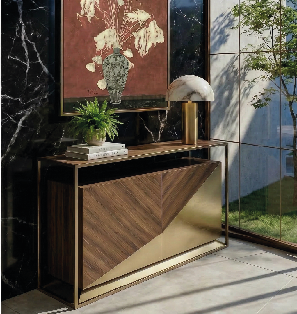 Bach console table with geometric wood and brass finish styled with lamp, books, and plant in modern interior.