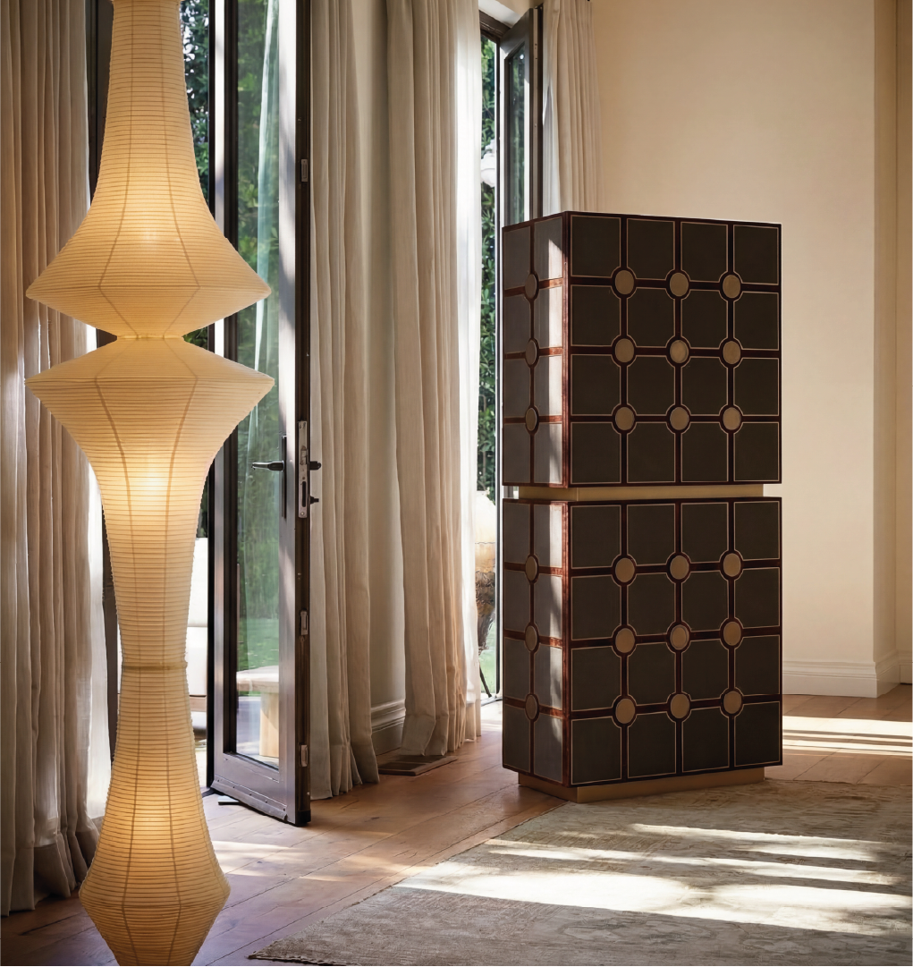 Stacked geometric cabinet in dark wood with textured panels in bright contemporary interior