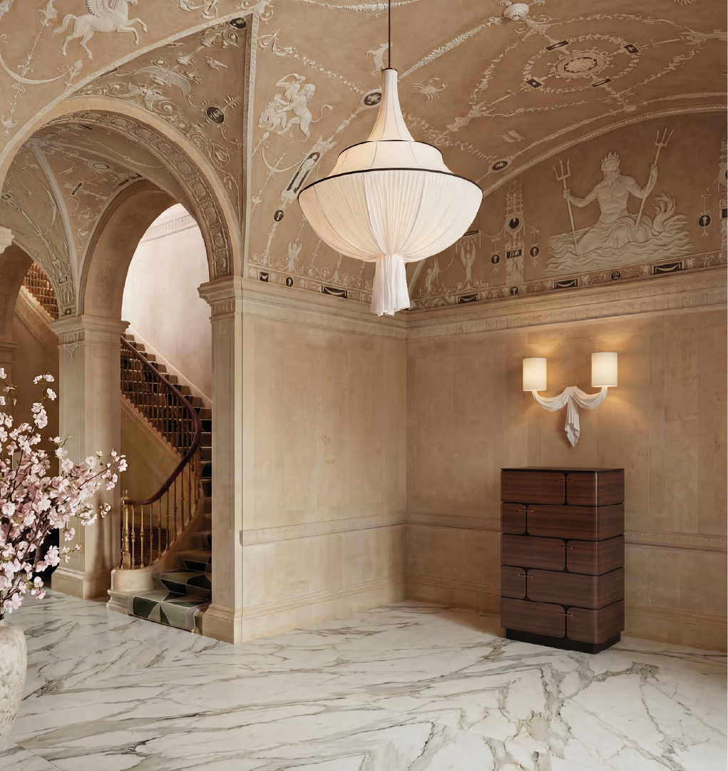 Walnut chest of drawers in elegant marble interior with staircase and decorative ceiling