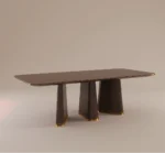 Strauss dining table with dark wood finish, sculptural tapered legs, and gold accents on a neutral background.
